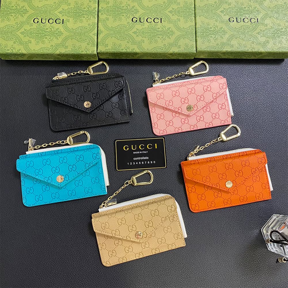 Gucci Embossed GG Supreme Card Holder with Gold-Tone Logo - Luxury Designer Wallet