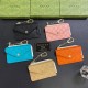 Gucci Embossed GG Supreme Card Holder with Gold-Tone Logo - Luxury Designer Wallet