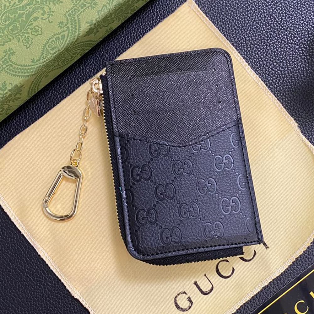 Gucci Embossed GG Supreme Card Holder with Gold-Tone Logo - Luxury Designer Wallet