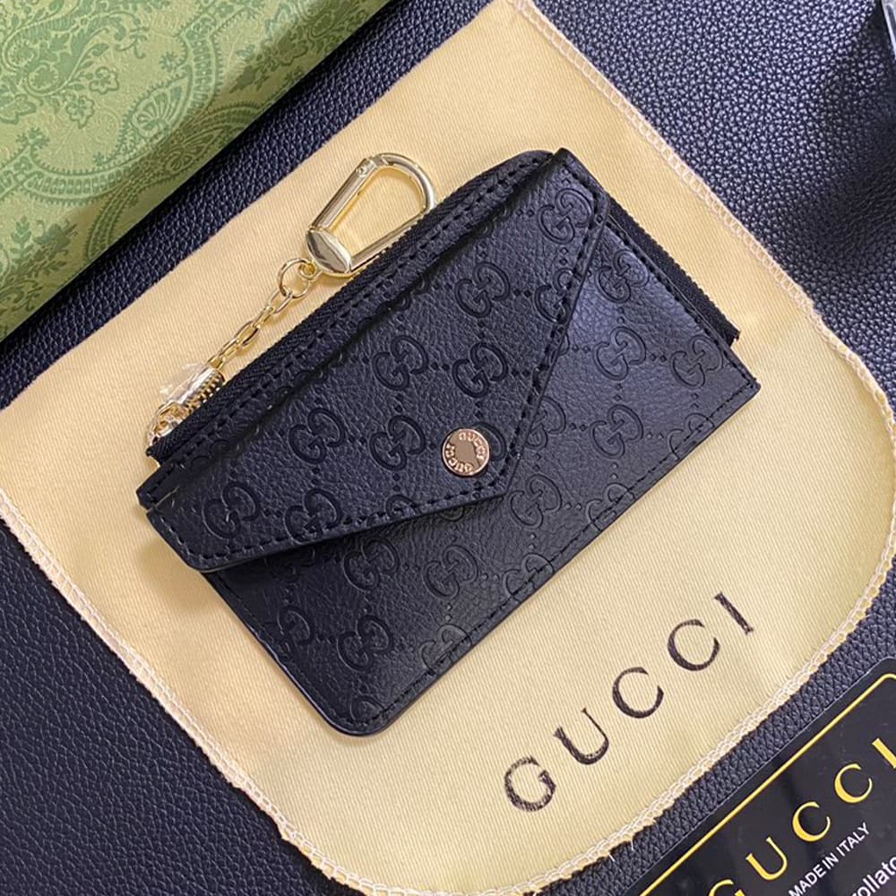 Gucci Embossed GG Supreme Card Holder with Gold-Tone Logo - Luxury Designer Wallet