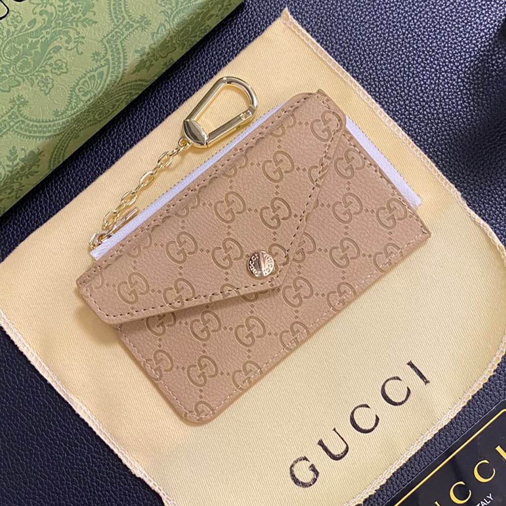 Gucci Embossed GG Supreme Card Holder with Gold-Tone Logo - Luxury Designer Wallet