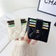 CHANEL Diamond Quilted Leather Foldable Luxury Card Holder - Designer Wallet with Gold Metal Logo