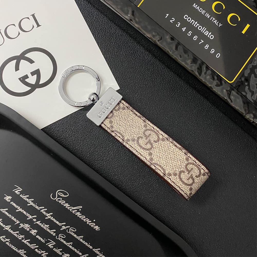 Gucci Silver-toned Ring Keychain - GG Monogram & Signature Accents in Premium Canvas/Leather