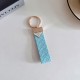 Prada Woven Leather Luxury Keychain - Signature Triangle Logo with Gold-Tone Hardware
