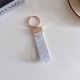 Prada Woven Leather Luxury Keychain - Signature Triangle Logo with Gold-Tone Hardware