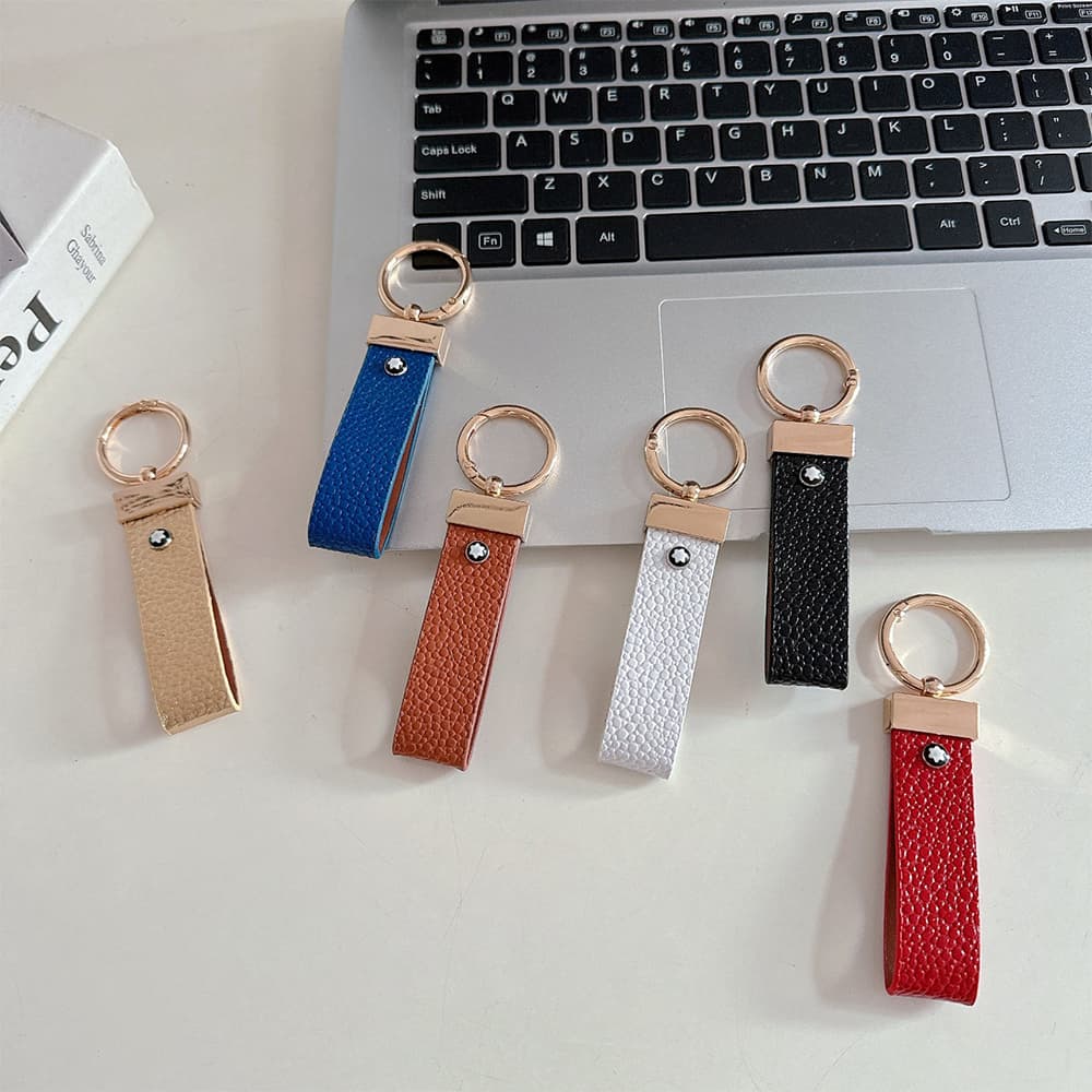 Montblanc Pebbled Leather Luxury Keychain - Hexagon Logo with Gold-Tone Hardware