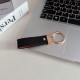 Montblanc Pebbled Leather Luxury Keychain - Hexagon Logo with Gold-Tone Hardware