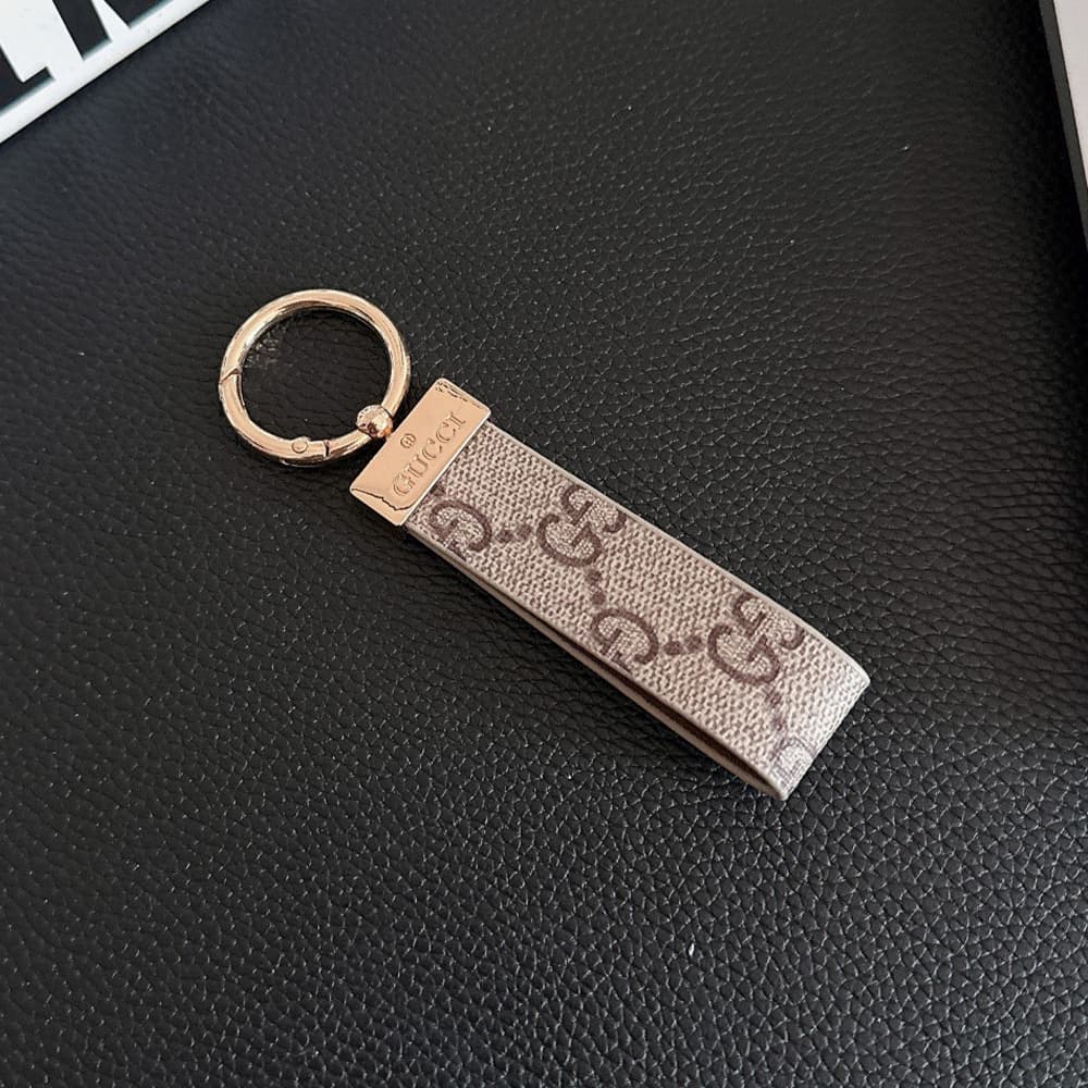Gucci GG Monogram Canvas Luxury Keychain - Gold-Tone Metal Plate