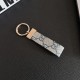 Gucci GG Monogram Canvas Luxury Keychain - Gold-Tone Metal Plate