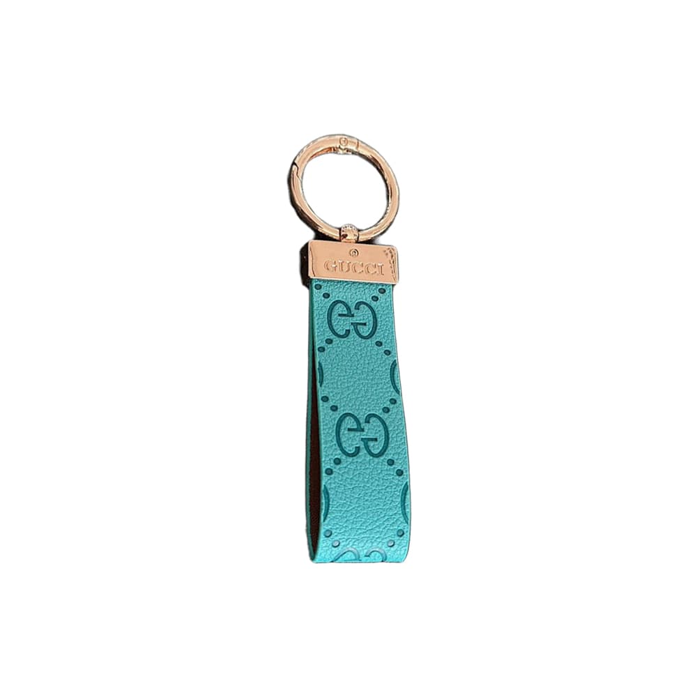 Gucci Embossed GG Monogram Leather Luxury Keychain - Gold-Tone Metal Accents