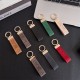 Dior CD Logo Leather Luxury Keychain - Gold-Tone Metal Accents