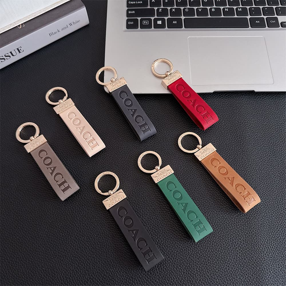 Coach Embossed Signature Leather Luxury Keychain - Carriage Logo Gold-Tone Hardware