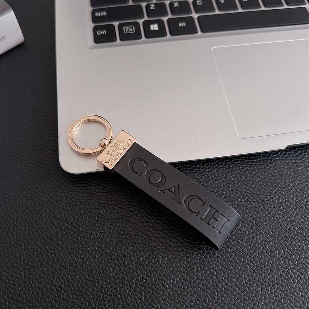 Coach Embossed Signature Leather Luxury Keychain - Carriage Logo Gold-Tone Hardware
