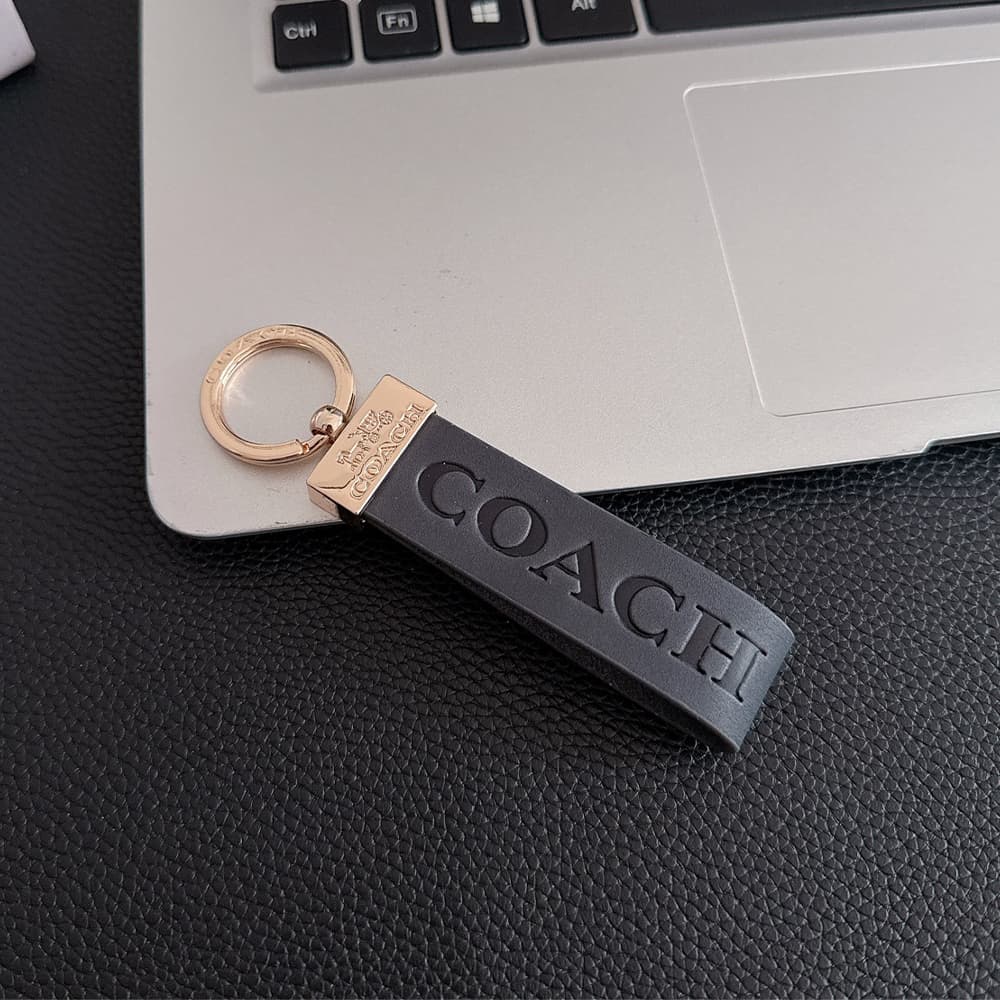 Coach Embossed Signature Leather Luxury Keychain - Carriage Logo Gold-Tone Hardware