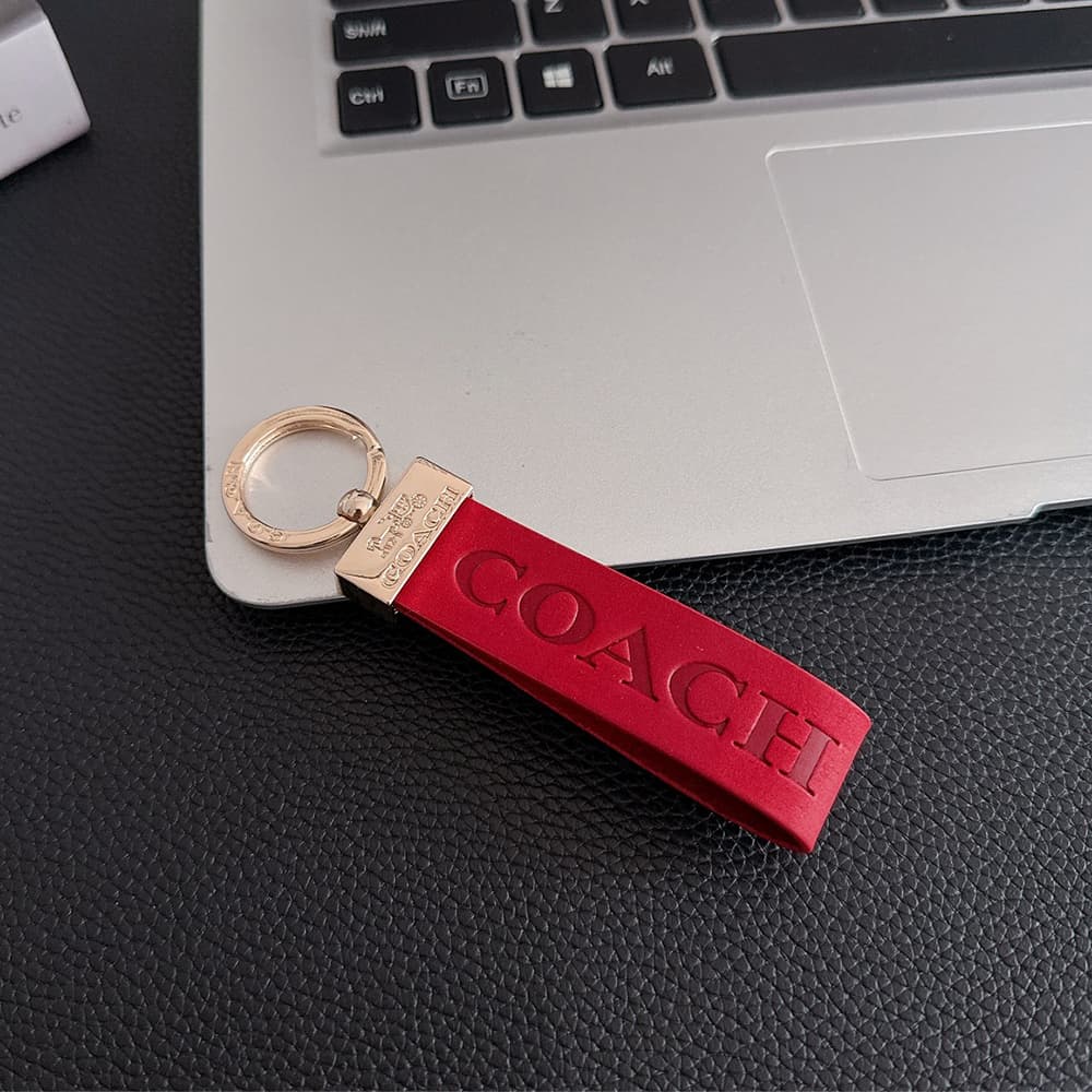 Coach Embossed Signature Leather Luxury Keychain - Carriage Logo Gold-Tone Hardware