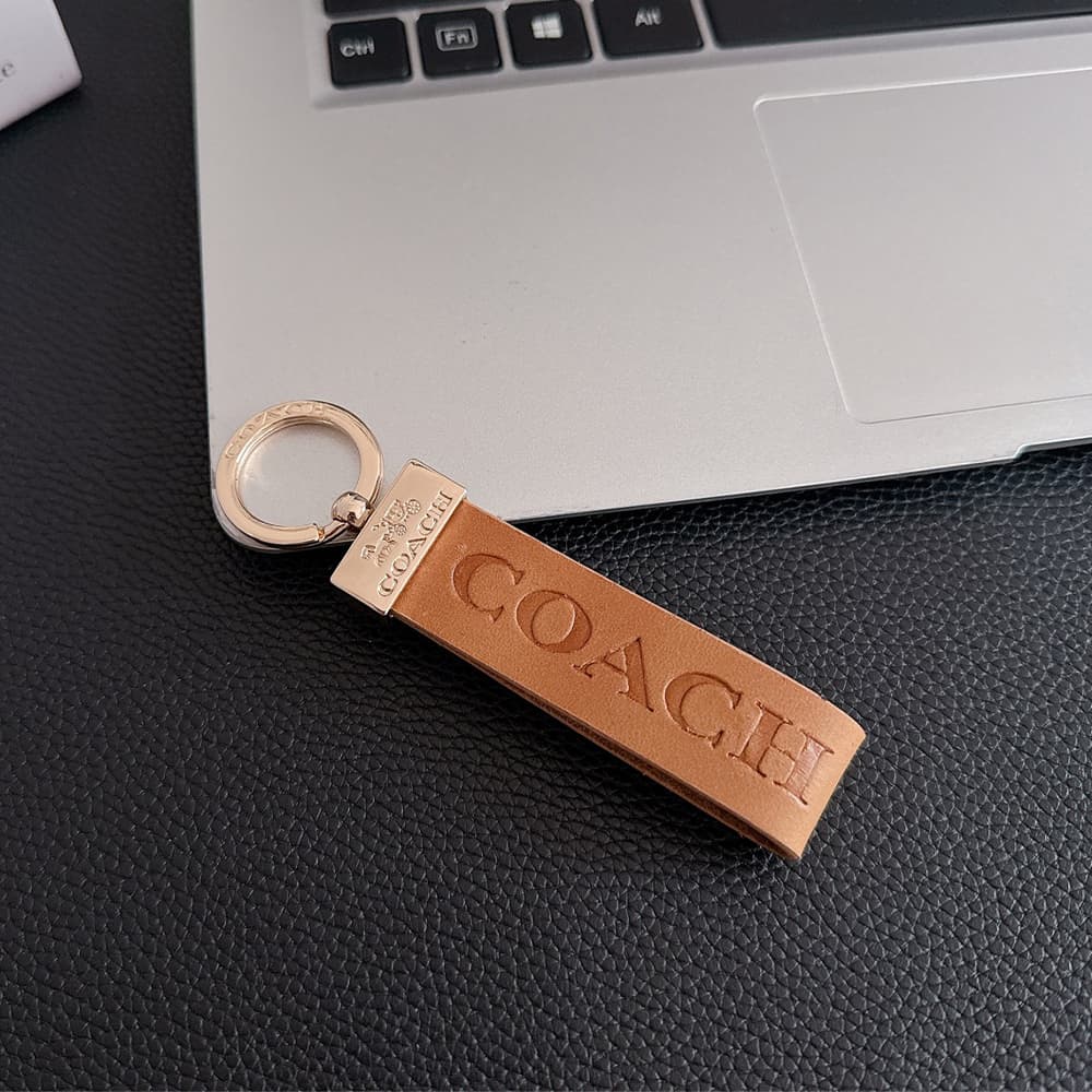 Coach Embossed Signature Leather Luxury Keychain - Carriage Logo Gold-Tone Hardware