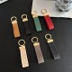 Gucci Embossed GG Monogram Leather Luxury Keychain - Gold-Tone Hardware