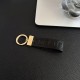 Gucci Embossed GG Monogram Leather Luxury Keychain - Gold-Tone Hardware