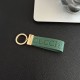 Gucci Embossed GG Monogram Leather Luxury Keychain - Gold-Tone Hardware
