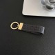 Gucci Embossed GG Monogram Leather Luxury Keychain - Gold-Tone Hardware