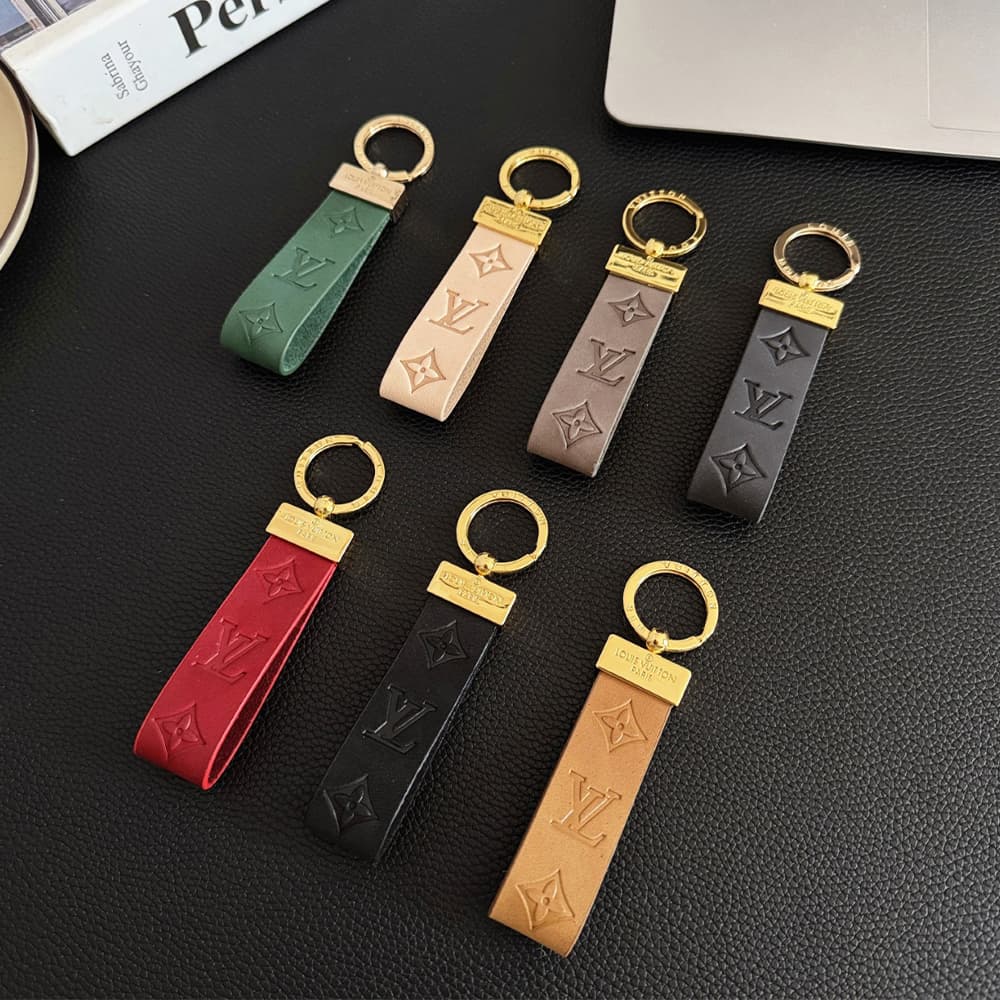 Louis Vuitton Embossed Monogram Leather Luxury Keychain - Gold-Tone Hardware