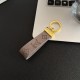 Louis Vuitton Embossed Monogram Leather Luxury Keychain - Gold-Tone Hardware