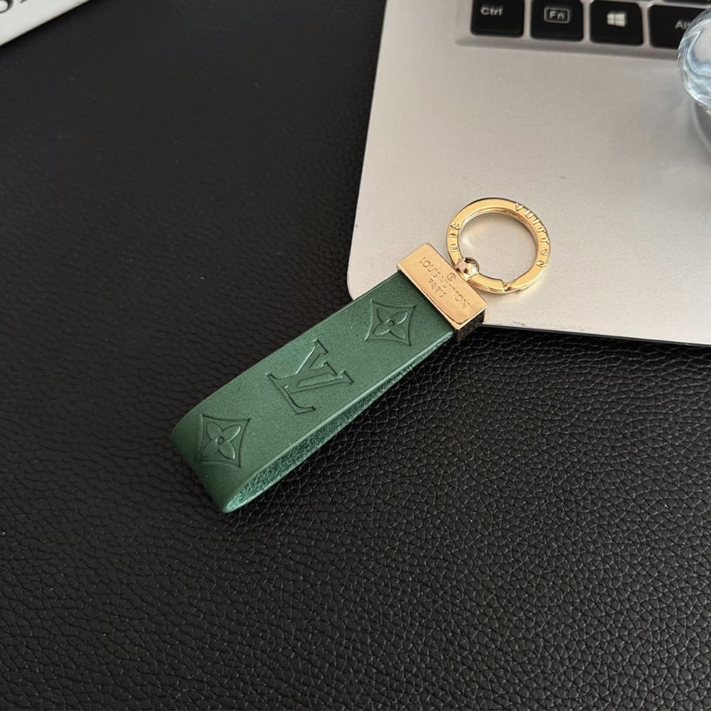 Louis Vuitton Embossed Monogram Leather Luxury Keychain - Gold-Tone Hardware