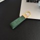 Louis Vuitton Embossed Monogram Leather Luxury Keychain - Gold-Tone Hardware