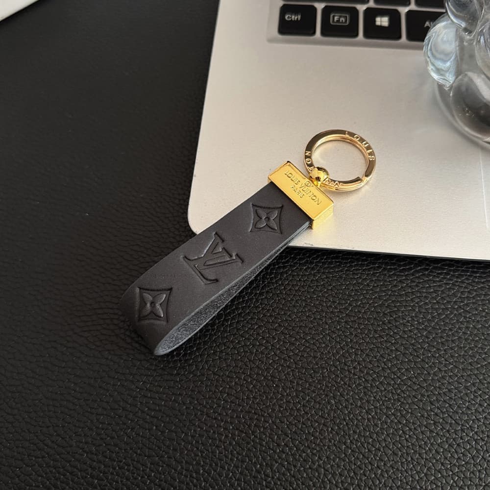 Louis Vuitton Embossed Monogram Leather Luxury Keychain - Gold-Tone Hardware