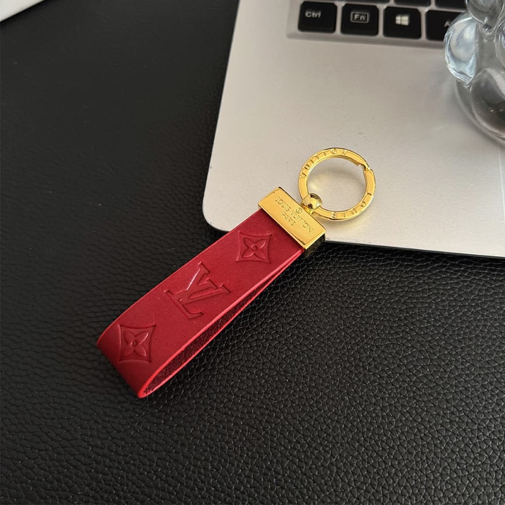 Louis Vuitton Embossed Monogram Leather Luxury Keychain - Gold-Tone Hardware