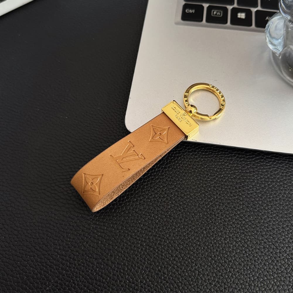 Louis Vuitton Embossed Monogram Leather Luxury Keychain - Gold-Tone Hardware