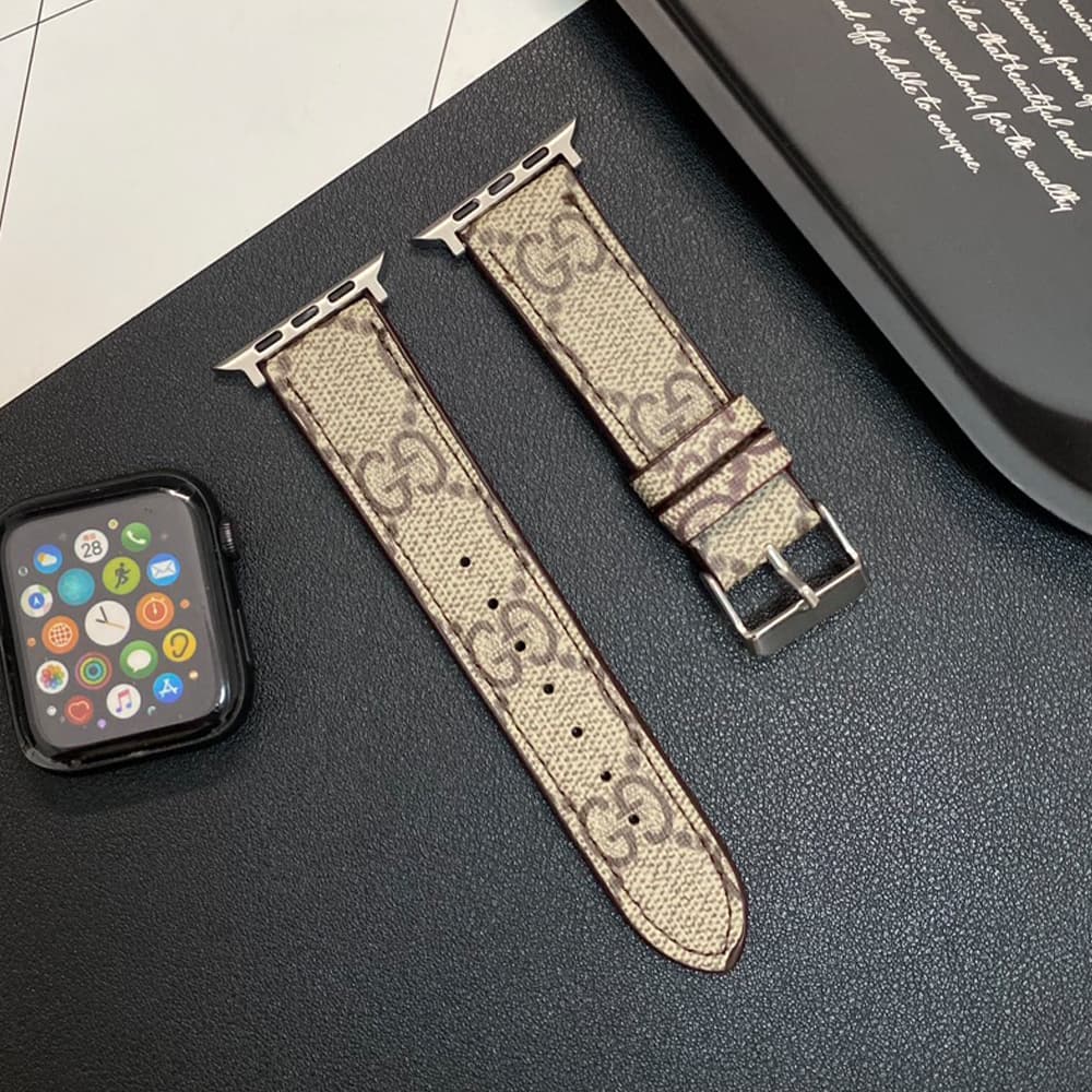 Gucci GG Luxury Apple Watch Band - Monogram with Gold-Tone Hardware Gucci GG Luxury Apple Watch Band - Monogram with Gold-Tone Hardware