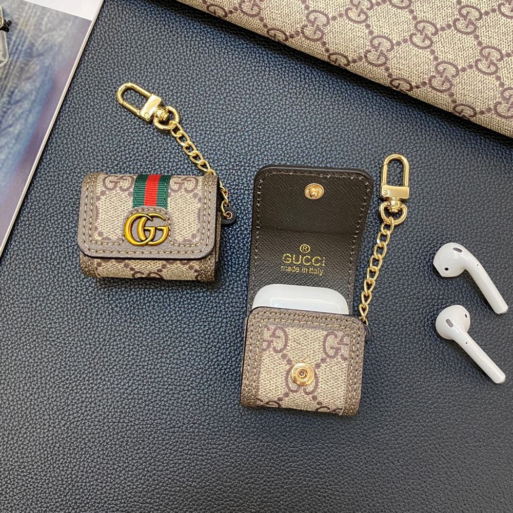 Gucci GG Supreme AirPods Case - Monogram Luxury Cover with Metal Logo & Chain (2 Universal Fits) Gucci GG Supreme AirPods Case - Monogram Luxury Cover with Metal Logo & Chain (2 Universal Fits)