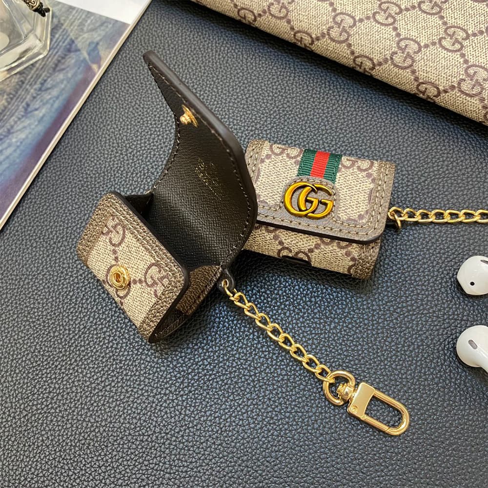 Gucci GG Supreme AirPods Case - Monogram Luxury Cover with Metal Logo & Chain (2 Universal Fits) Gucci GG Supreme AirPods Case - Monogram Luxury Cover with Metal Logo & Chain (2 Universal Fits)