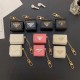 Prada AirPods Case - Triangle Logo Luxury Cover with Gold Chain (2 Universal Fits) Prada AirPods Case - Triangle Logo Luxury Cover with Gold Chain (2 Universal Fits)