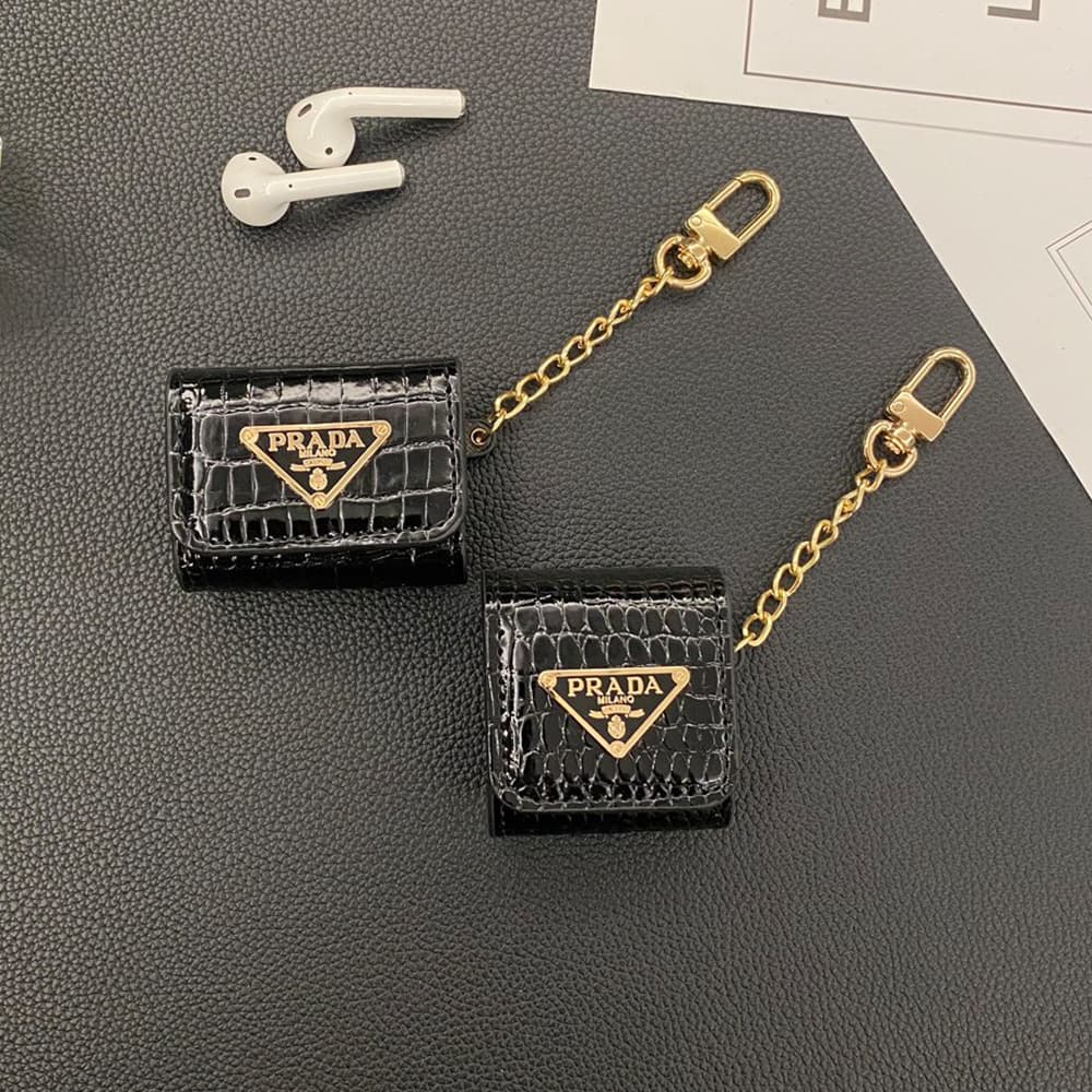 Prada AirPods Case - Triangle Logo Luxury Cover with Gold Chain (2 Universal Fits) Prada AirPods Case - Triangle Logo Luxury Cover with Gold Chain (2 Universal Fits)