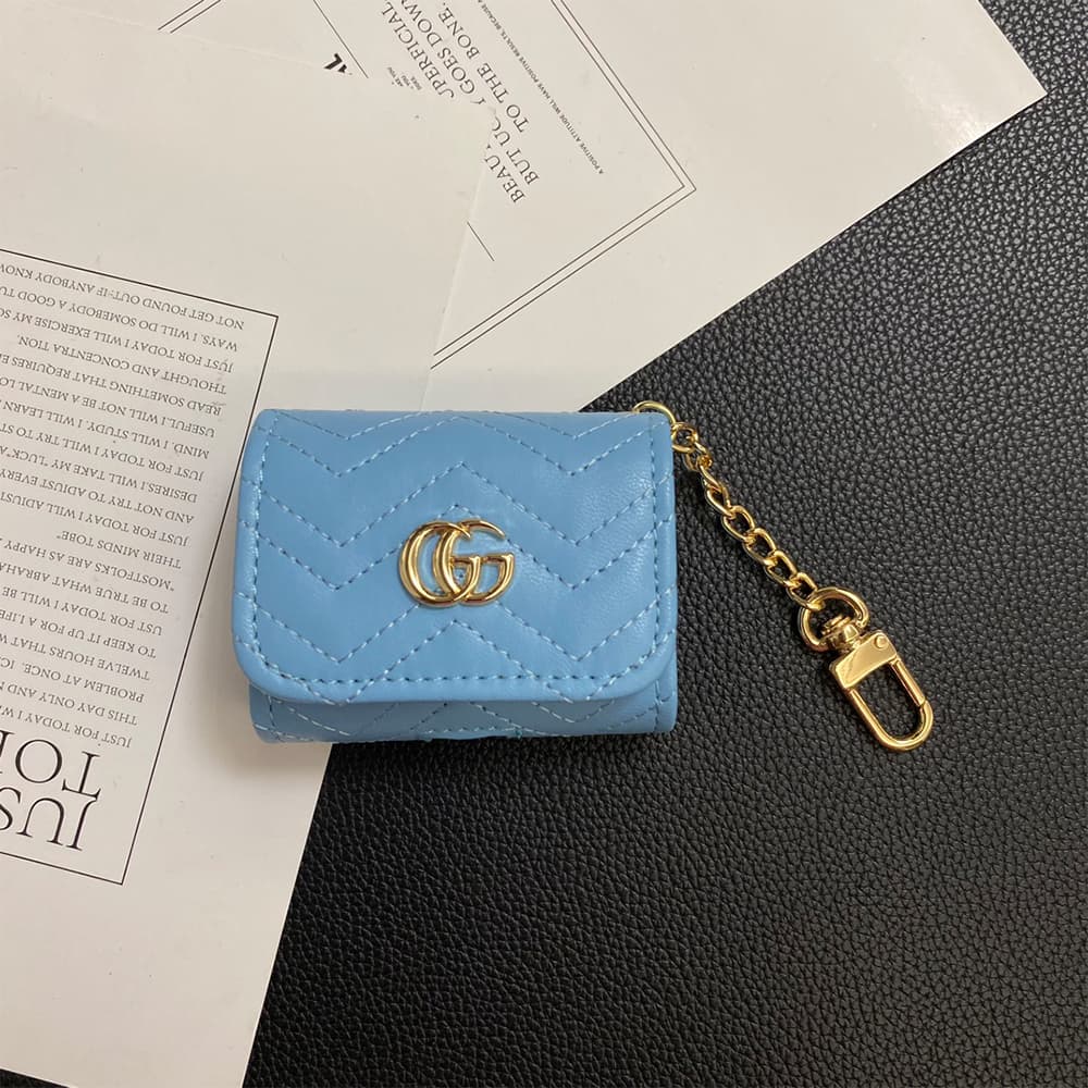 Gucci GG Luxury AirPods & Samsung Buds Case - Wave Pattern with Gold Chain Gucci GG Luxury AirPods & Samsung Buds Case - Wave Pattern with Gold Chain
