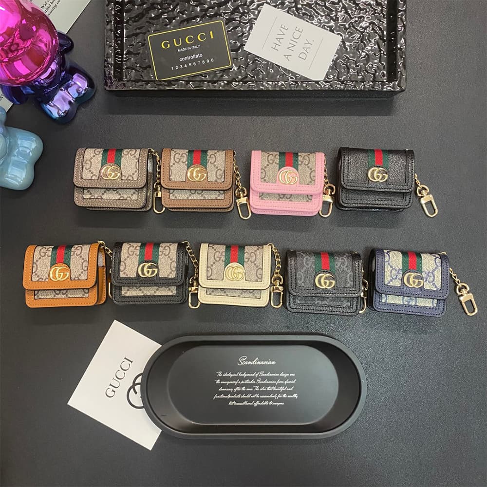 Gucci GG Luxury AirPods & Samsung Buds Case - Monogram with Web Strap & Metal Logo