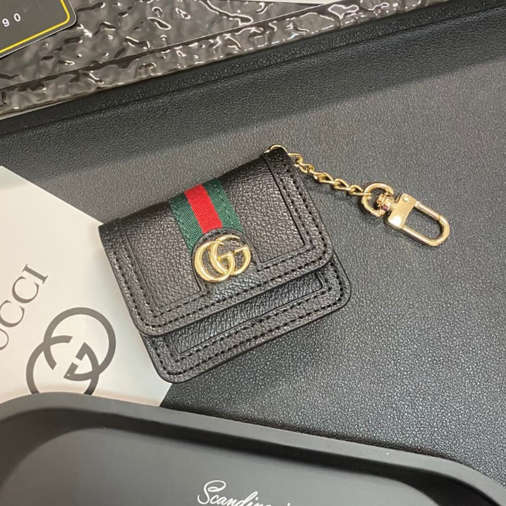 Gucci GG Luxury AirPods & Samsung Buds Case - Monogram with Web Strap & Metal Logo Gucci GG Luxury AirPods & Samsung Buds Case - Monogram with Web Strap & Metal Logo