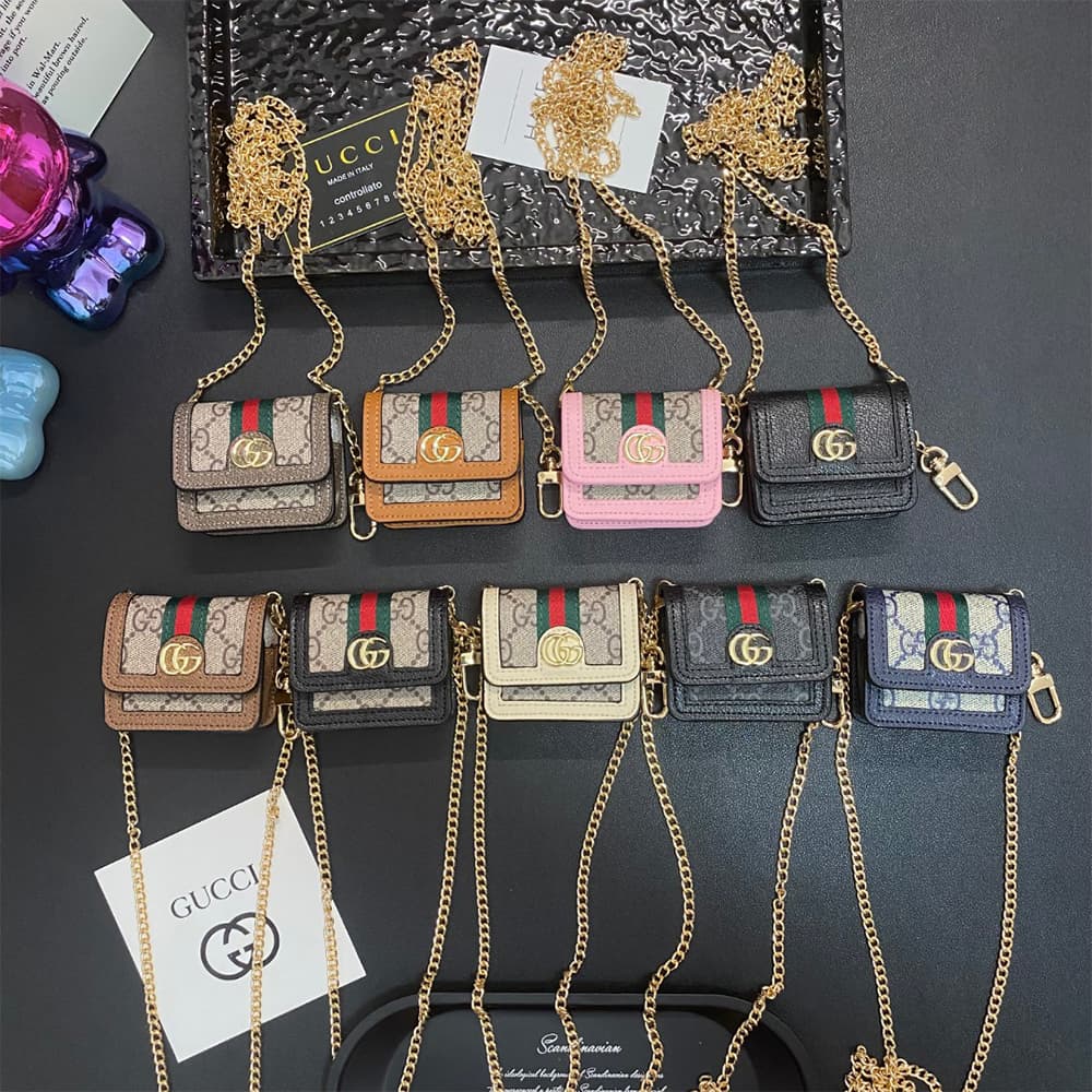 Gucci GG Luxury AirPods & Samsung Buds Case - Monogram with Web Strap & Metal Logo Gucci GG Luxury AirPods & Samsung Buds Case - Monogram with Web Strap & Metal Logo