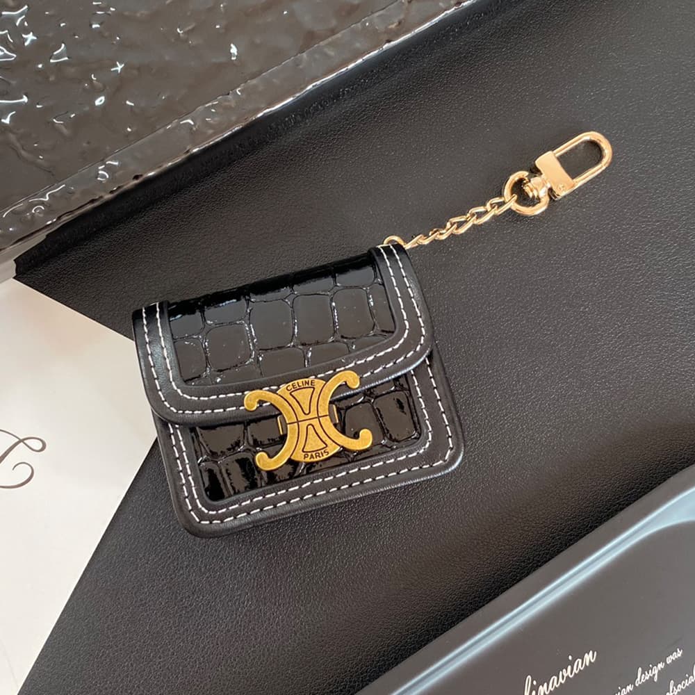 CELINE Triomphe Luxury AirPods & Samsung Buds Case - Embroidered Monogram with Gold Charm CELINE Triomphe Luxury AirPods & Samsung Buds Case - Embroidered Monogram with Gold Charm