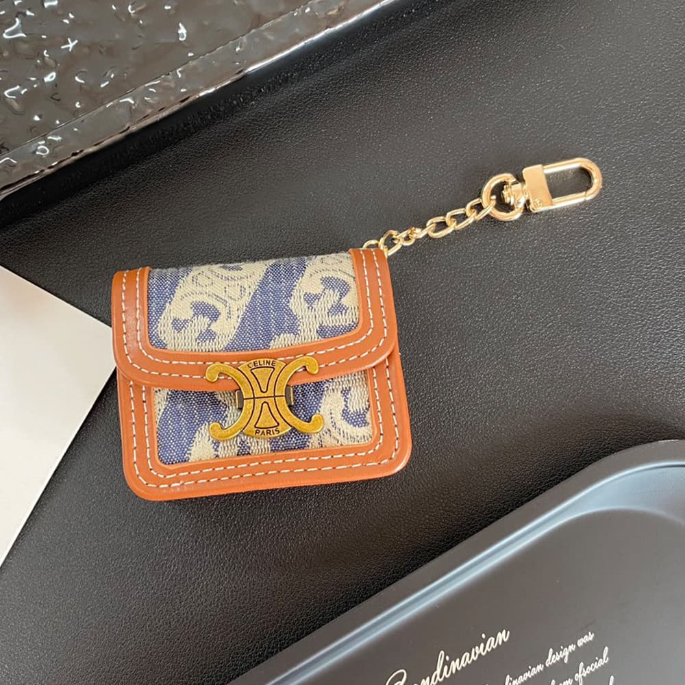 CELINE Triomphe Luxury AirPods & Samsung Buds Case - Embroidered Monogram with Gold Charm CELINE Triomphe Luxury AirPods & Samsung Buds Case - Embroidered Monogram with Gold Charm