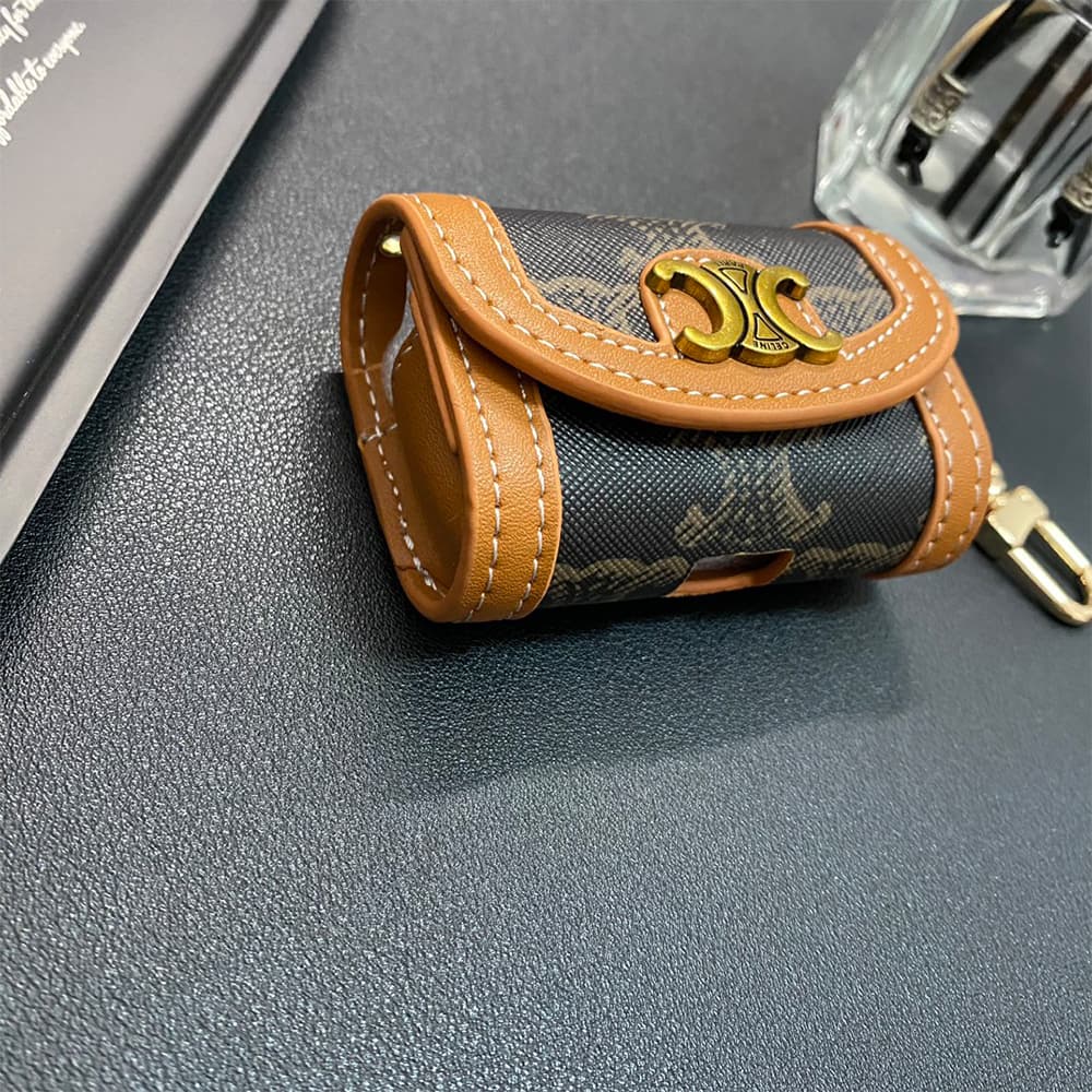 Celine Triomphe Luxury AirPods Case - Leather Trim & Metal Chain (Fits Samsung Buds) Celine Triomphe Luxury AirPods Case - Leather Trim & Metal Chain (Fits Samsung Buds)