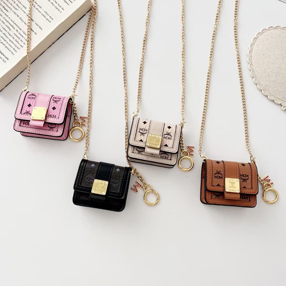 MCM Luxury AirPods & Samsung Buds Case - Monogram Leather with Detachable 'M' Chain MCM Luxury AirPods & Samsung Buds Case - Monogram Leather with Detachable 'M' Chain