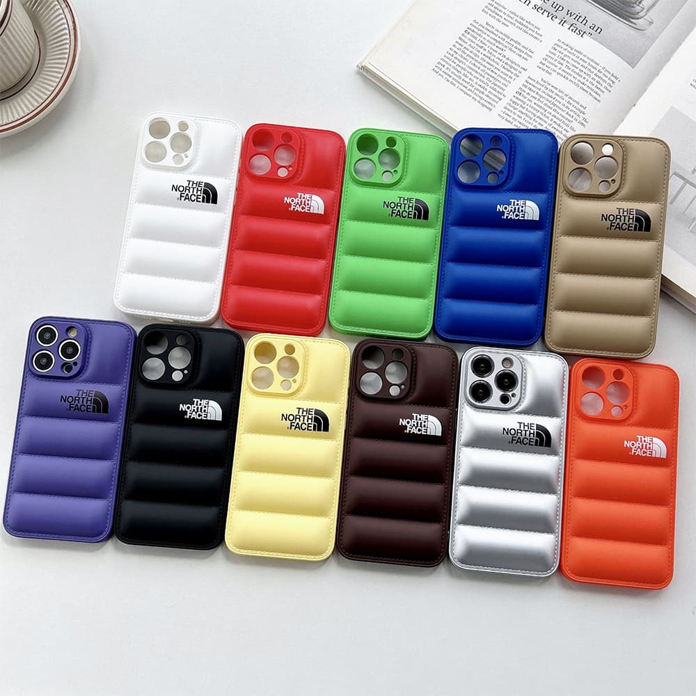 The North Face Puffer iPhone Case - Quilted Outdoor Design with TNF Logo (Multiple Colors)
