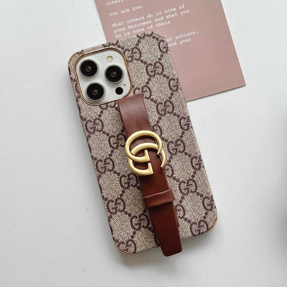 Gucci GG Supreme iPhone Case with Adjustable Leather Strap - Luxury Designer Protection Gucci GG Supreme iPhone Case with Adjustable Leather Strap - Luxury Designer Protection