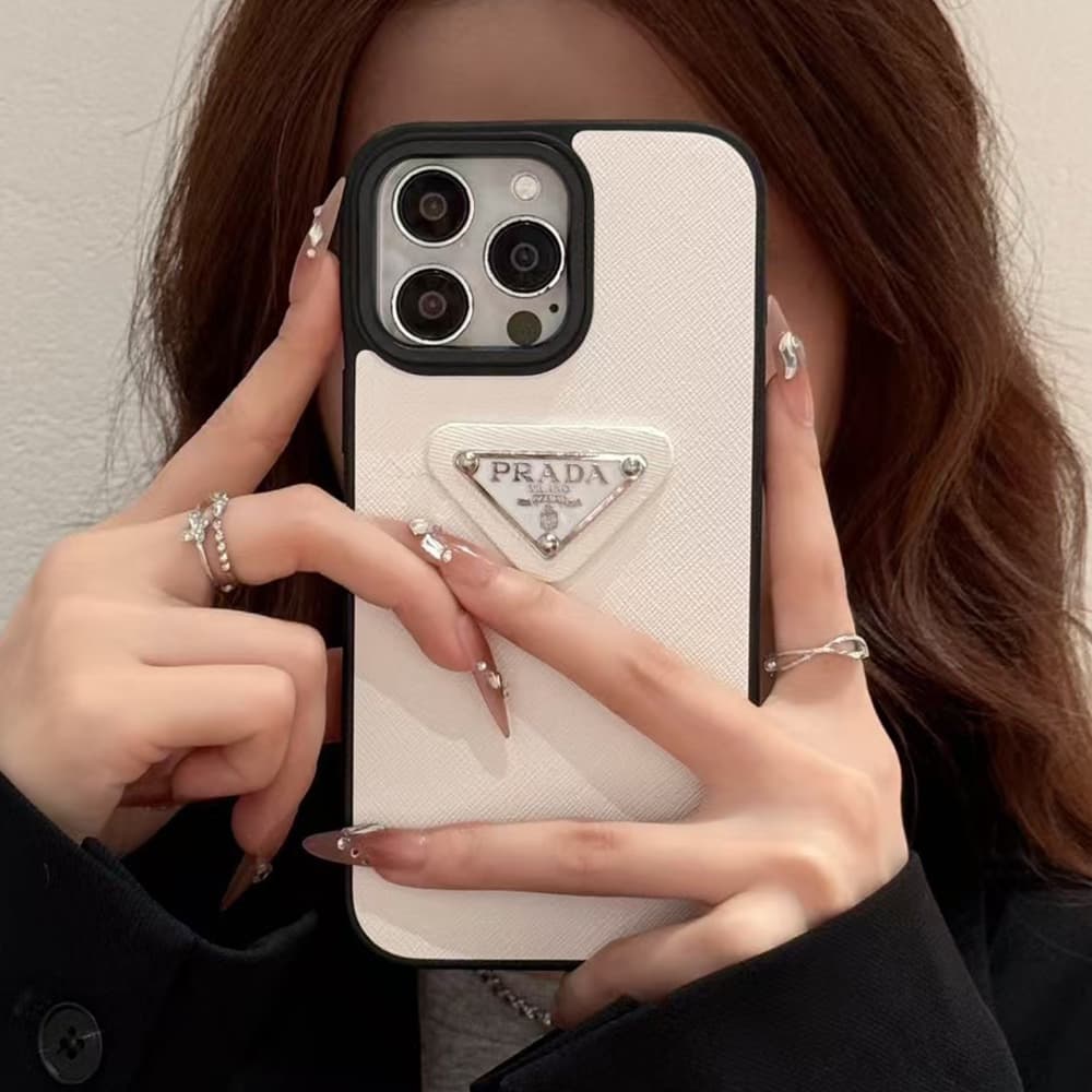 Prada Luxury iPhone Case - Leather Accent with Metal Logo (Pink/Black/White) Prada Luxury iPhone Case - Leather Accent with Metal Logo (Pink/Black/White)