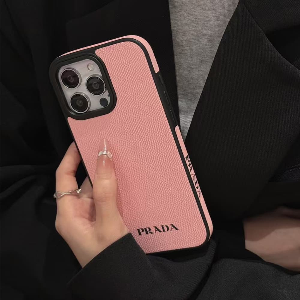 Prada Luxury iPhone Case - Leather Accent with Metal Logo (Pink/Black/White) Prada Luxury iPhone Case - Leather Accent with Metal Logo (Pink/Black/White)