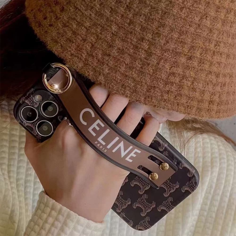 Celine Luxury iPhone Case - Triomphe Pattern with Leather Wrist Strap & Ring Stand (TPU Protective Case) Celine Luxury iPhone Case - Triomphe Pattern with Leather Wrist Strap & Ring Stand (TPU Protective Case)