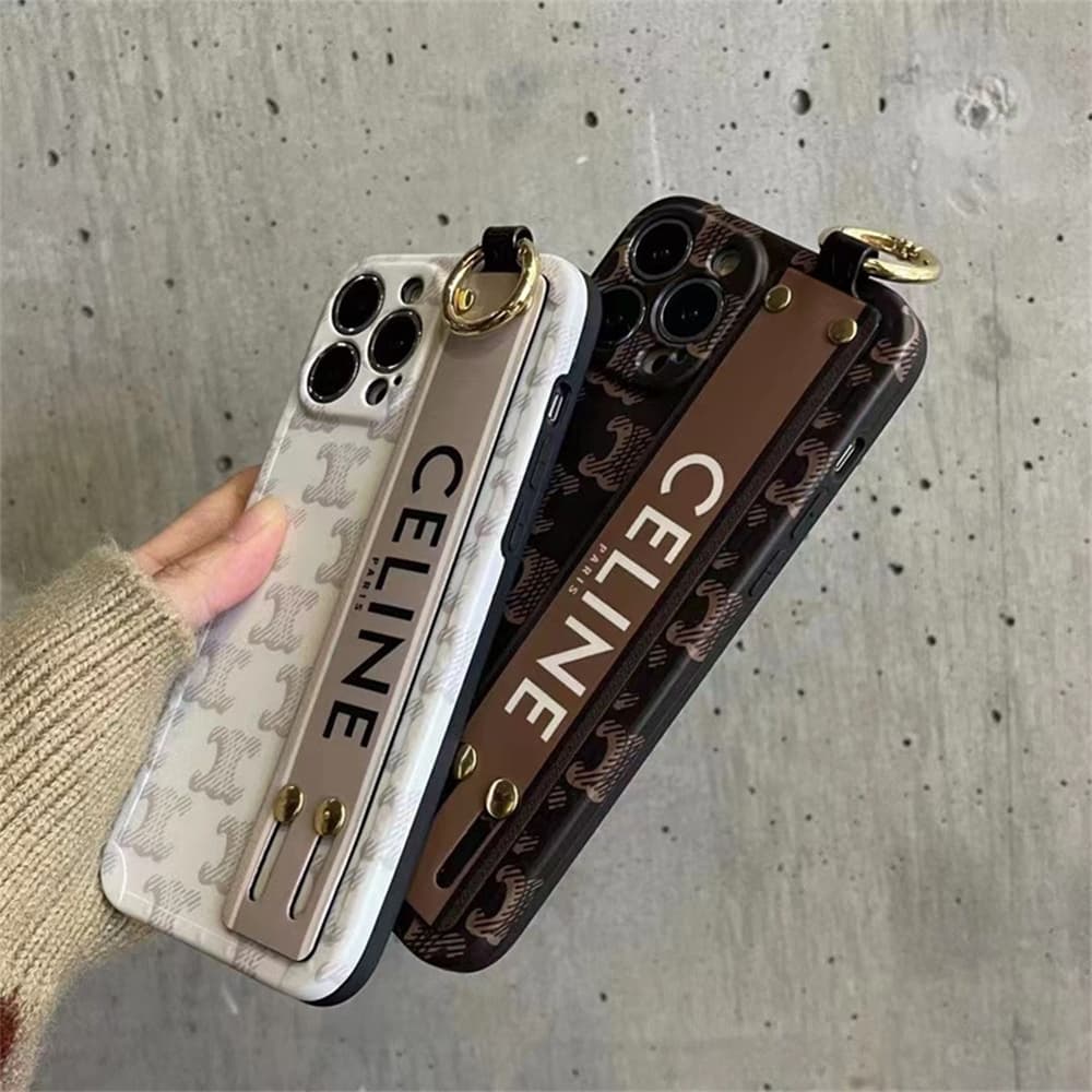 Celine Luxury iPhone Case - Triomphe Pattern with Leather Wrist Strap & Ring Stand (TPU Protective Case) Celine Luxury iPhone Case - Triomphe Pattern with Leather Wrist Strap & Ring Stand (TPU Protective Case)